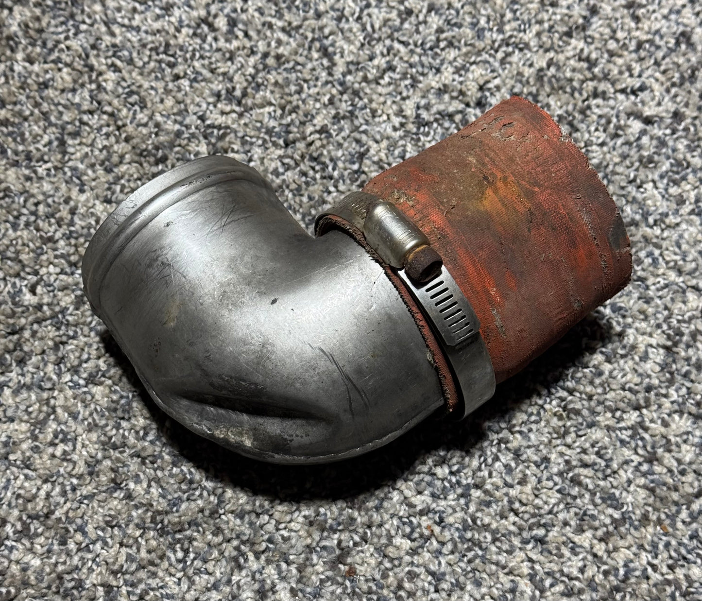 51126-000 PA-31T Starter Generator Cooling Elbow Assy (Small Dent)