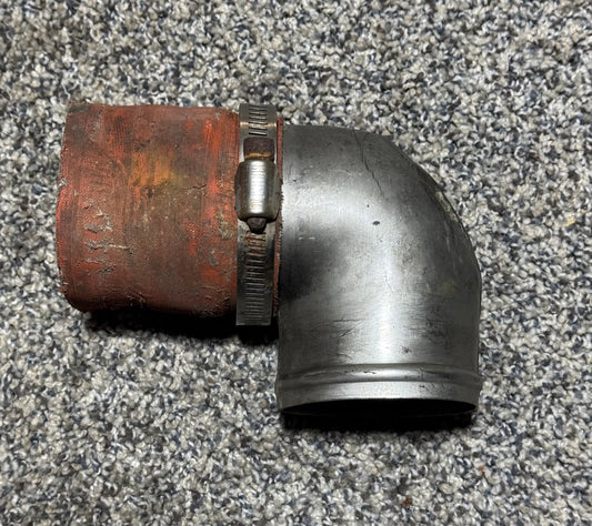 51126-000 PA-31T Starter Generator Cooling Elbow Assy (Small Dent)